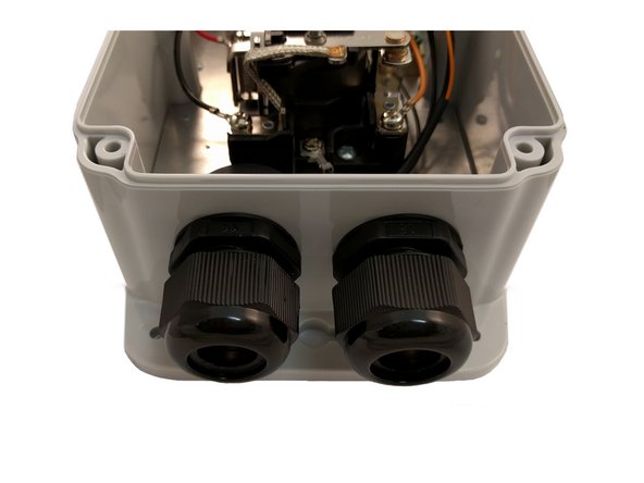 Install cable glands on the enclosure with seals on the outside.