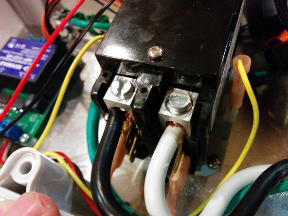 Insert the AC Input cable through a Cable Gland and assemble loosely into the hole in the box.