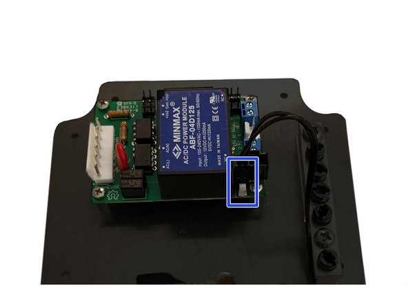 Connect the black wire on the UBEC WiFi power supply to the Ground screw terminal on the OpenEVSE controller.