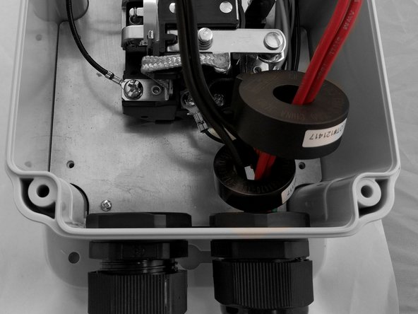 Thread ALL hot and neutral lines through the 4 wire GFCI coil with the orange self test loop.