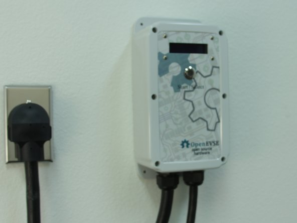 Center Mount (Portable) - Slide screws through the large opening.  Shift the station either to the left or right. Tighten the screws as necessary to keep the station in place.