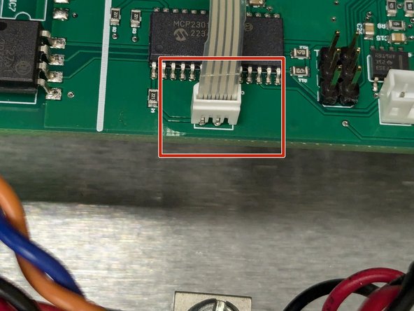 Connect the ribbon cable for the indicator lights.