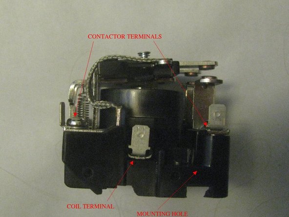 With the plate the correct way up, mount the OpenEVSE board on the nylon spacers with four 5/8" screws and lock nuts. The nuts should go on the back of the plate, not as shown in the photo (I ground down one nut to fit).