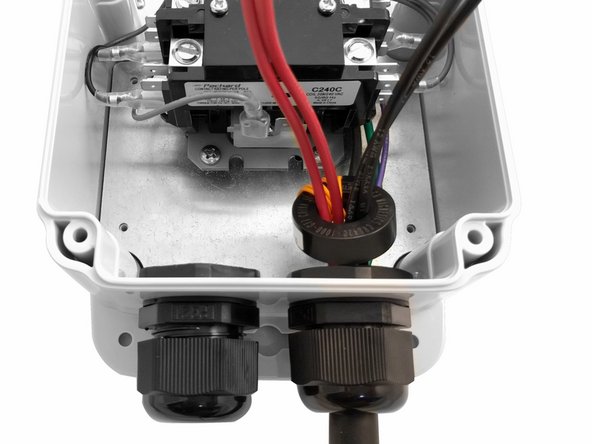 Route the ground and pilot wires low in the enclosure up the right side.