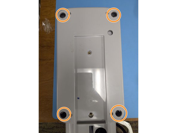 Secure the lid with the 4 Phillips head screws