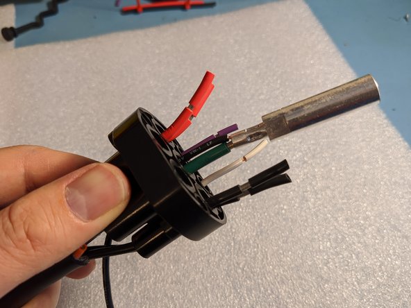 Remove insulation from the GREEN and BLACK wire.