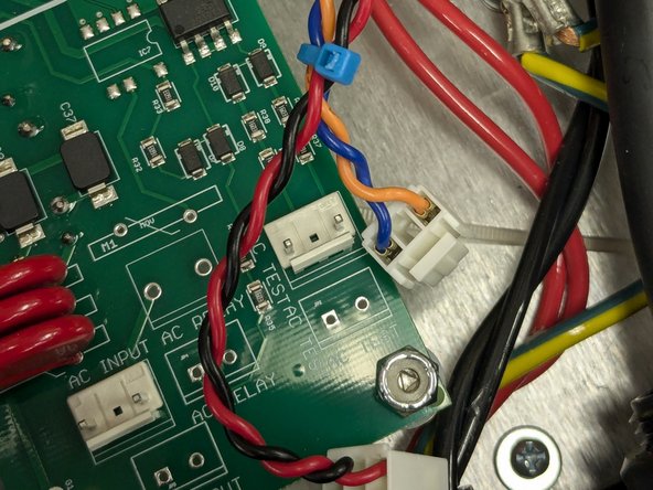 Identify the AC wires coming from the circuit board/Relay Module. Tie wrap them together.