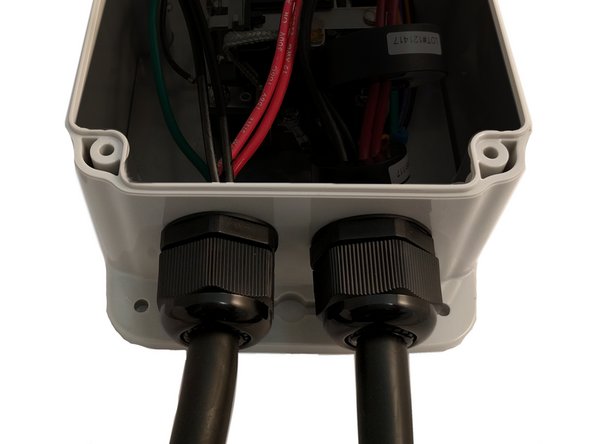 Insert Input cable through the cable gland on the Left and tighten.