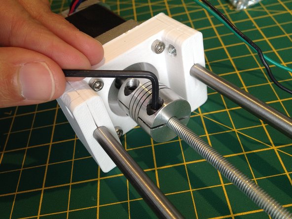 Attach the flexible coupling to the stepper motor and the threaded rod.