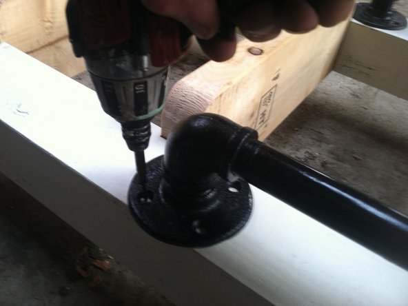 Make sure that the overlap of the flange is on the outside. This will keep people's clothes from catching on it as the go up and down.