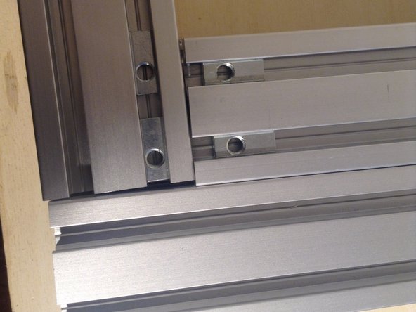 Put 4 spring nuts in each corner to mount the 4040 member