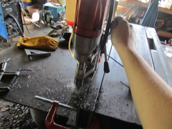 Use a Mag-Drill to drill the 3/4&quot; holes each place where the horizontal members overlap the vertical members.