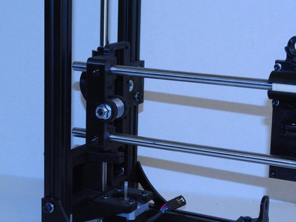 Using 4 M3 x 12 SHCS, lock the rods in place at the X ends.