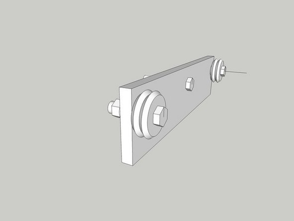 Assemble the bearings to the plate as shown, with lock washers on each side of the main plate.