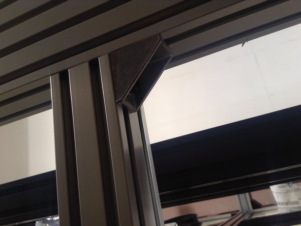 Insert rubber gasket in the bottom window edge. Poke in with the blunt end of a pen or some other object that helps the rubber to be pushed in the groove to create a tight seal.