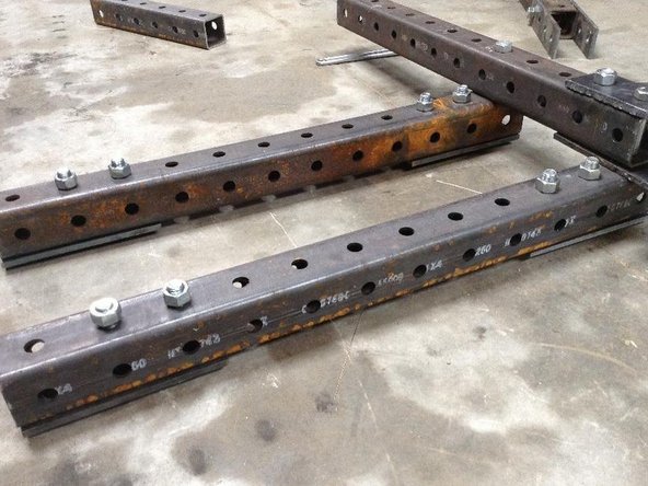 Attach using 7&quot; bolts with two holes extended beyond the end of the 12-hole tube.