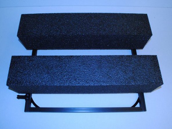 Lay the front and back frame squares together with the spacer foam.