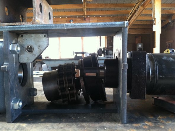 Place hub. Insert nut and pin to hold in place.