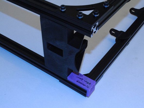 Using fixtures, set the location of the Name plate, Z motor mounts and Feed tube holder.