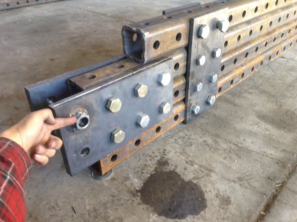 Weld the drilled out nuts to the plates where shown.