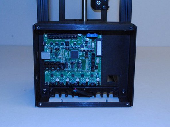 Set the bottom of the Electronics case flush with the bottom of the assembly.