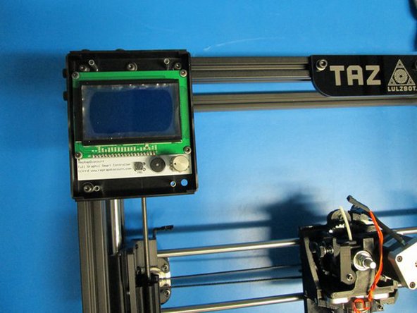 Using 4x M3 x 12 SHCS and M3 Washers, attach the LCD cover.