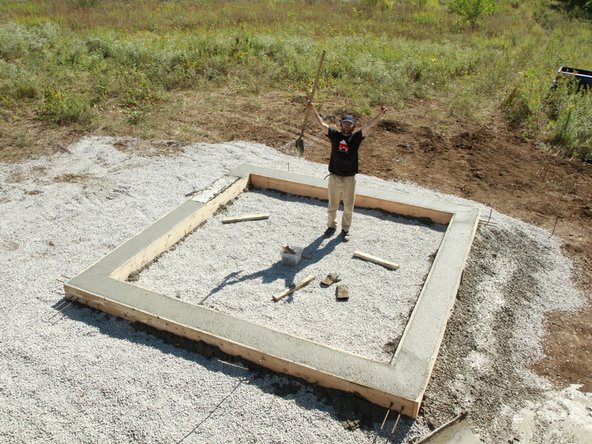 Pour concrete into foundation forms. Fill the foundation forms with concrete and smooth off the top with a screed board. We had a truck deliver the concrete, but you could also mix it yourself in a concrete mixer or in a wheelbarrow with a mixing hoe.