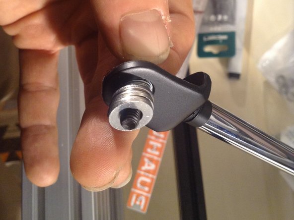 Use 2 larger washers and 5 smaller washers on a 20 mm screw, and then 3 more larger washers.