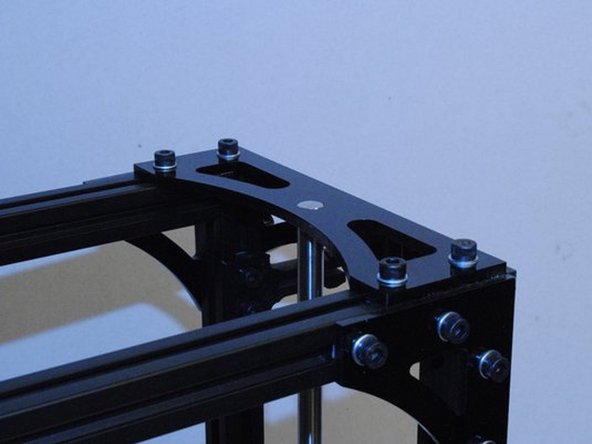 Slide a 10mm smooth rod up through the bottom of the right Z motor mount.