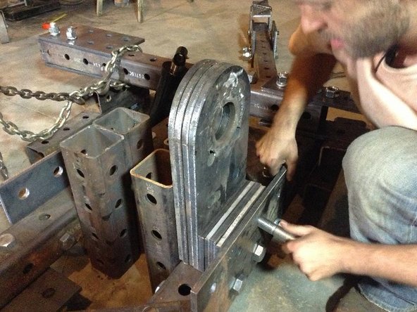 Hold nut inside tube to do this.