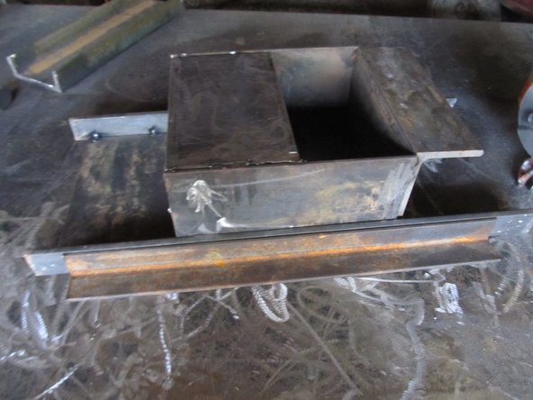 Place the roof and inner rails in their respective places. See Diagram.