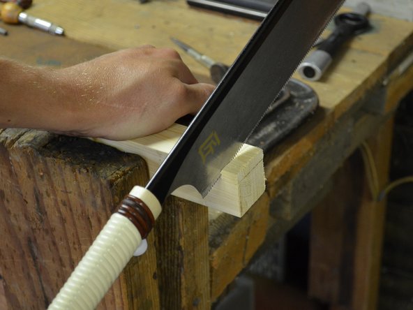 Just as before, align the dozuki blade to the edge of the workpiece and make a couple of preliminary cuts to ensure you're on the right path.