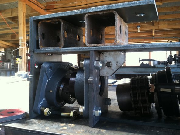 Place hub. Insert nut and pin to hold in place.