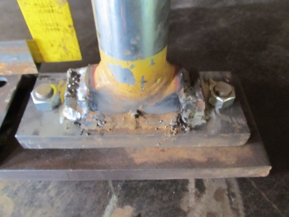 Put the upper press foot into the lower one and tighten nuts onto the threaded rod.