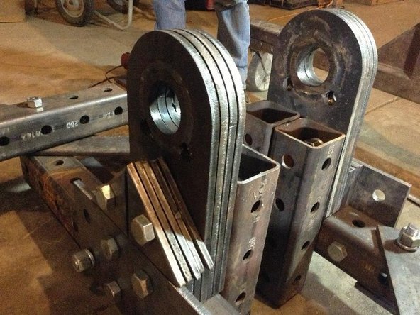 Bolt the Pivot Plates to the Main Pivot Tubes.