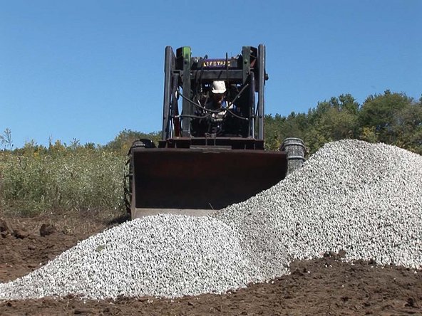 Clear vegetation from the site. We used the OSE pulverizer on the Life Trac 6.