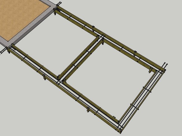 Once you have the forms staked and the all-thread in place, you can lay the long pieces of rebar into the forms. These pieces rest on the all-thread which holds them halfway up the thickness of the foundation.