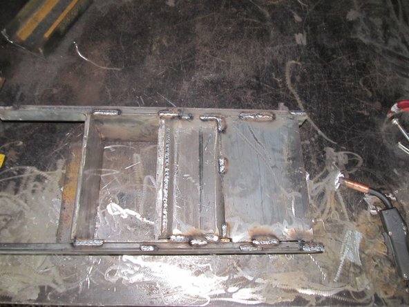 All the seams should be completely welded except the difficult to reach places between the inner and outer rails, those can be welded about 50%.