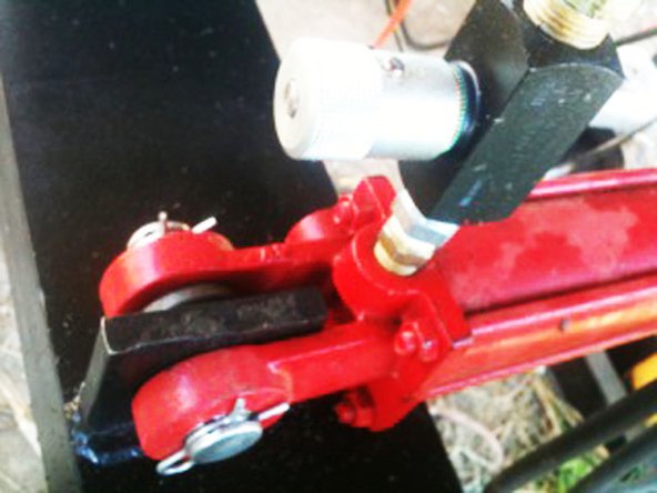 On the side which attaches to the secondary arm, put the pin through the mount, a 1&quot; washer, and the cylinder.