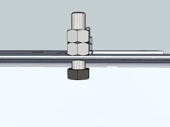 Grind away any spatter between the bolts.