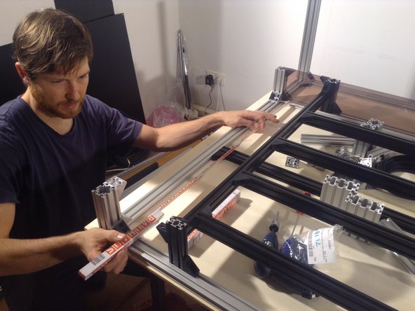 Mount the base brackets of table to the outer frame - both for the front and back side of the table.