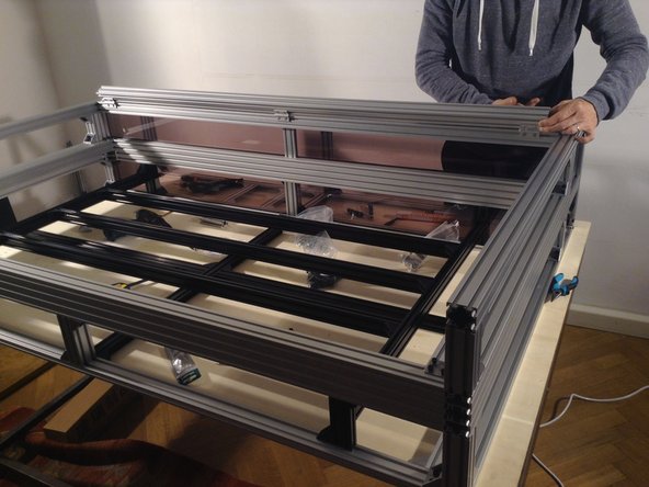 When mounting the 4040 extrusion - push it all the way up so that hinges can close fully. The hinges must pushed as far to the corner of the extrusion as possible.