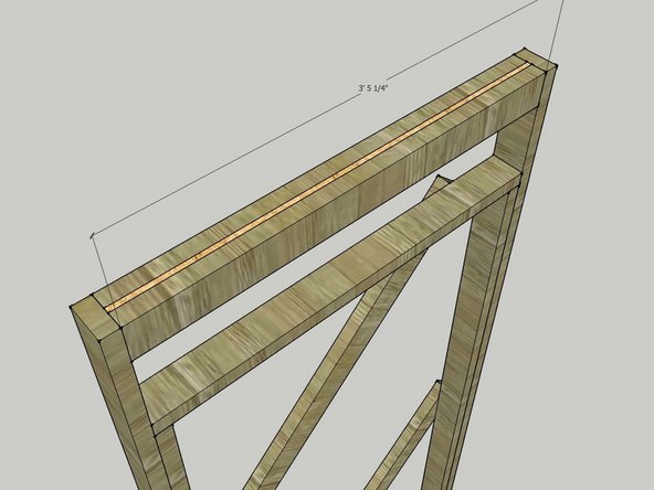 The header is made of two 2x4s with 1/2" sheet material sandwiched in between them. See image 2 for a close-up of the header.