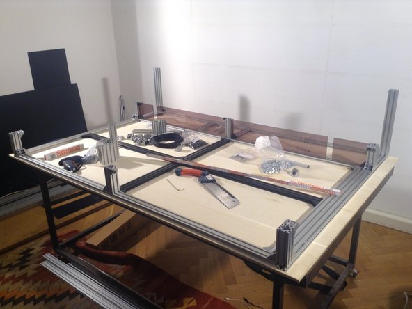 Take out the panels, insert the table frame.