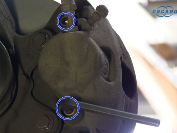 Repositionner l'étrier et revisser les 2 vis