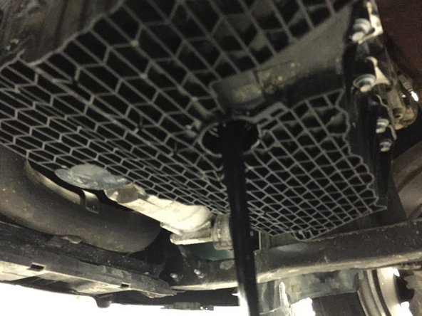 
Unscrew the cap by hand a quarter turn to remove it.
