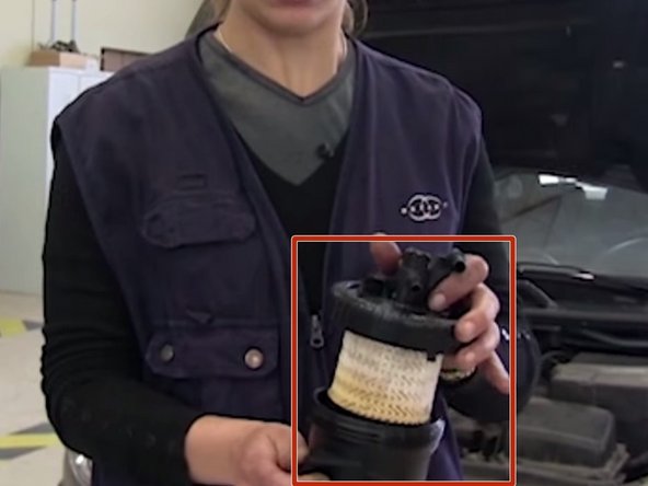 Repositionner votre filtre à carburant dans son socle