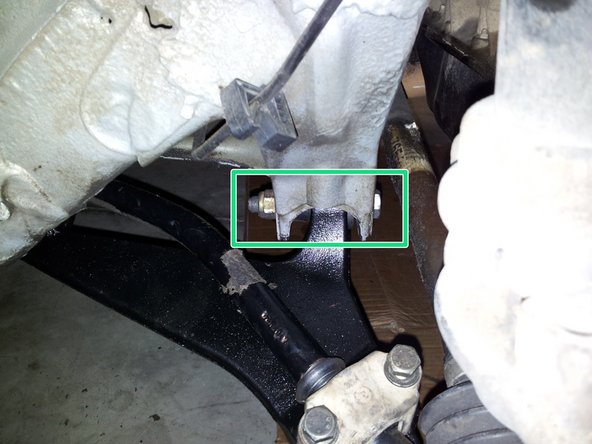 Engager le pivot avant dans son emplacement et engager la vis