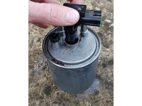 Tournez le réchauffeur d'1/4 de tour pour pouvoir le sortir.