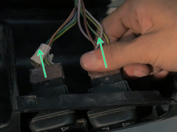 
The connectors hold the storage compartment, pull on them to disconnect them from the window lifter controls
